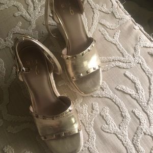 Ladies wedge with ankle strap size 8. Worn one time.